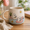 Handbemalter Keramik-Sommerkaffeebecher, doppelseitiges Design, cremefarbene, gesprenkelte Oberfläche